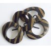 TL-073 Set of Four Elliptical Horn Napkin Rings With Stripe Motif. One of Many Beautiful Handcrafted, Exclusive and Luxurious Accessories from Adesso Wholesale.